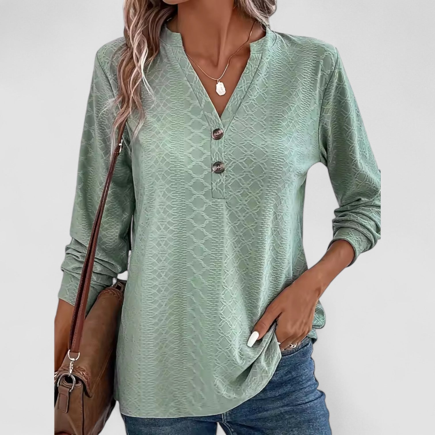 Ilse – Topp med knappar och mjukt fall